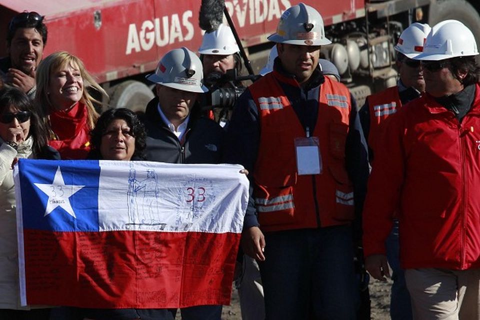 Relatives of the trapped miners await further news of their rescue in Chile (AP)