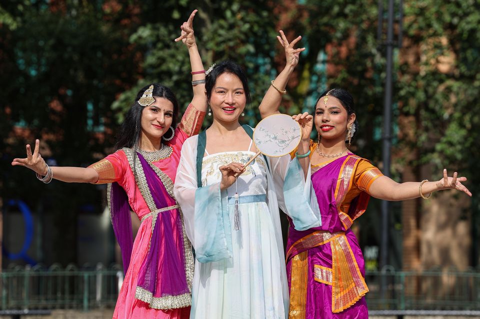 Dancers Leyla Gailius, Wei Hong Tu and Diya Bhattacharya at the launch of the 18th Belfast Mela Festival. Photo: William Cherry/Presseye