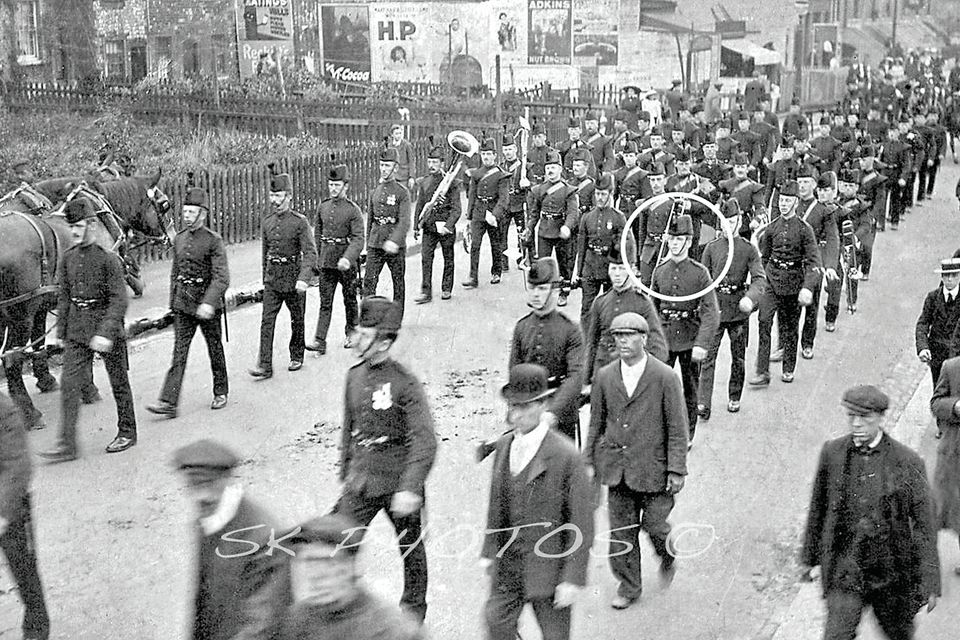 Into the unknown: Rifleman Jackson Clarke (circled) marching off to war