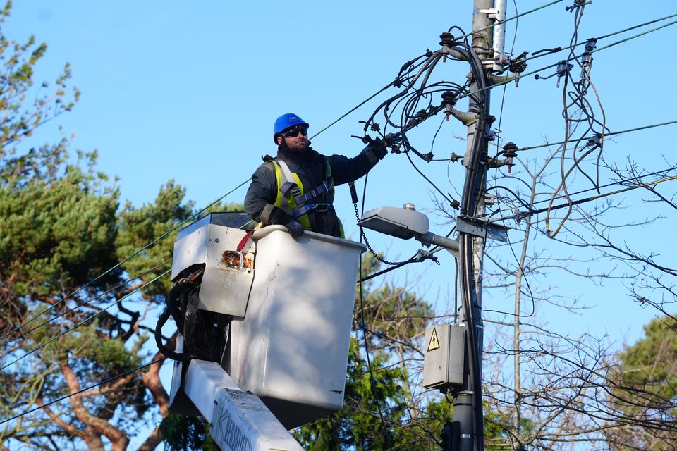 ESB Networks crew working to restore power in Avoca Avenue in Blackrock, Co Dublin (Brian Lawless/PA)