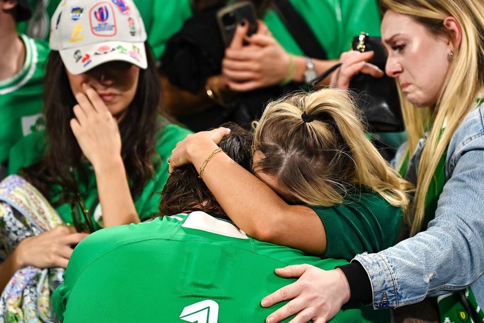 Andrew Porter of Ireland is consoled by his wife Elaine after his side's defeat in the 2023 Rugby World Cup quarter-final match