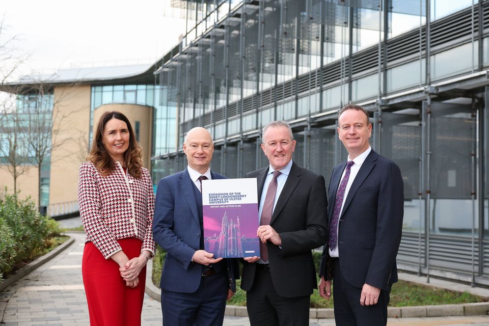 Nicola Skelly, vice-chair of the Magee Taskforce; Professor Paul Bartholomew, vice-chancellor of Ulster University; Economy Minister Conor Murphy, and  Magee Taskforce chair Stephen Kelly with the action plan (Press Eye)