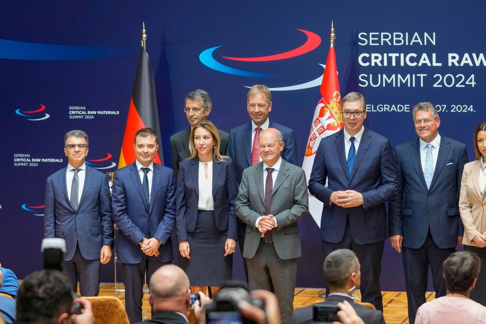 Serbian President Aleksandar Vucic, centre, poses with German Chancellor Olaf Scholz, center left, and European Commission vice president Maros Sefcovic, center right, at the Serbia Palace in Belgrade (Darko Vojinovic/AP)