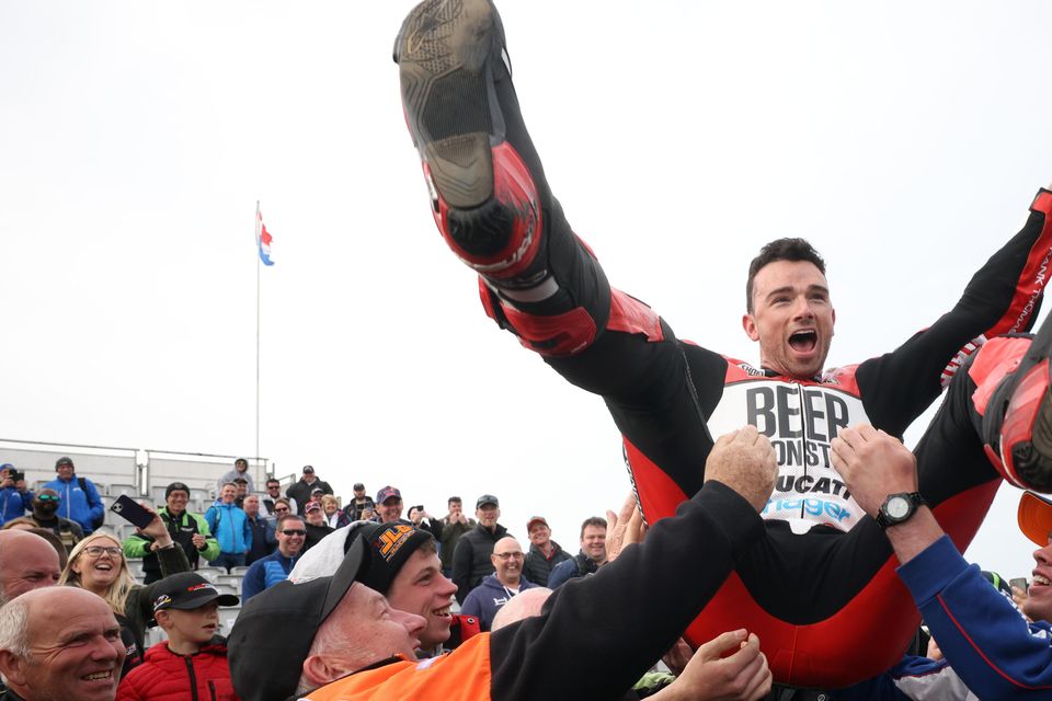 Glenn Irwin celebrates his success in the Superbike class during 2023's North West 200