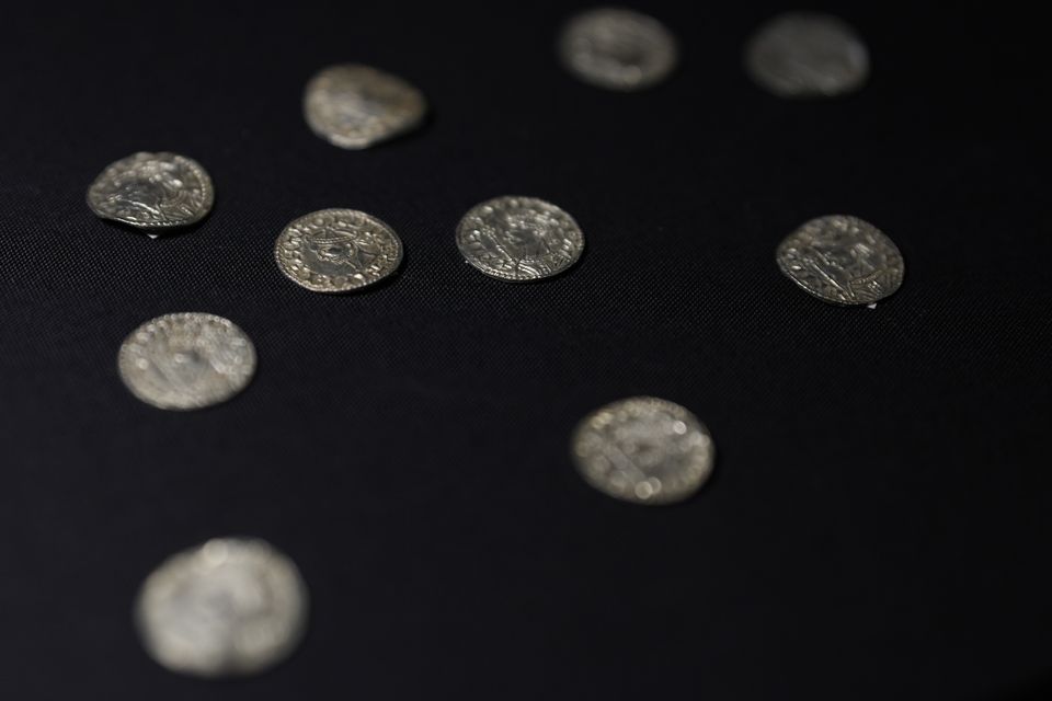 A selection of coins dating from around the Norman invasion in 1066, part of the Chew Valley Hoard, on display at the British Museum (Alastair Grant/AP)