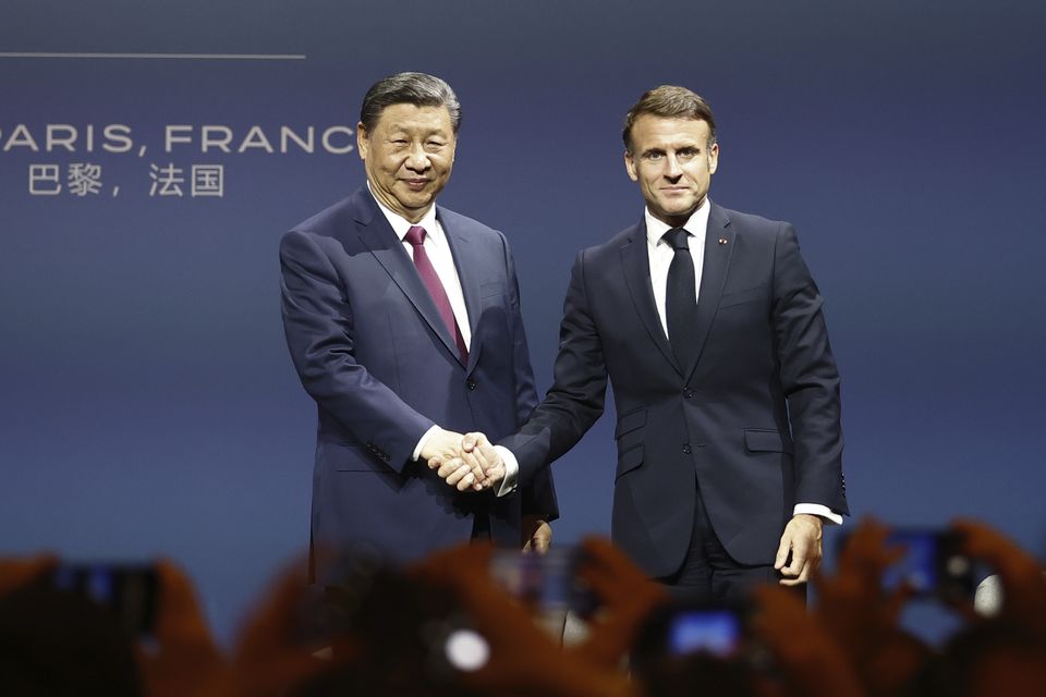 French President Emmanuel Macron and Chinese President Xi Jinping (Mohammed Badra, Pool via AP)