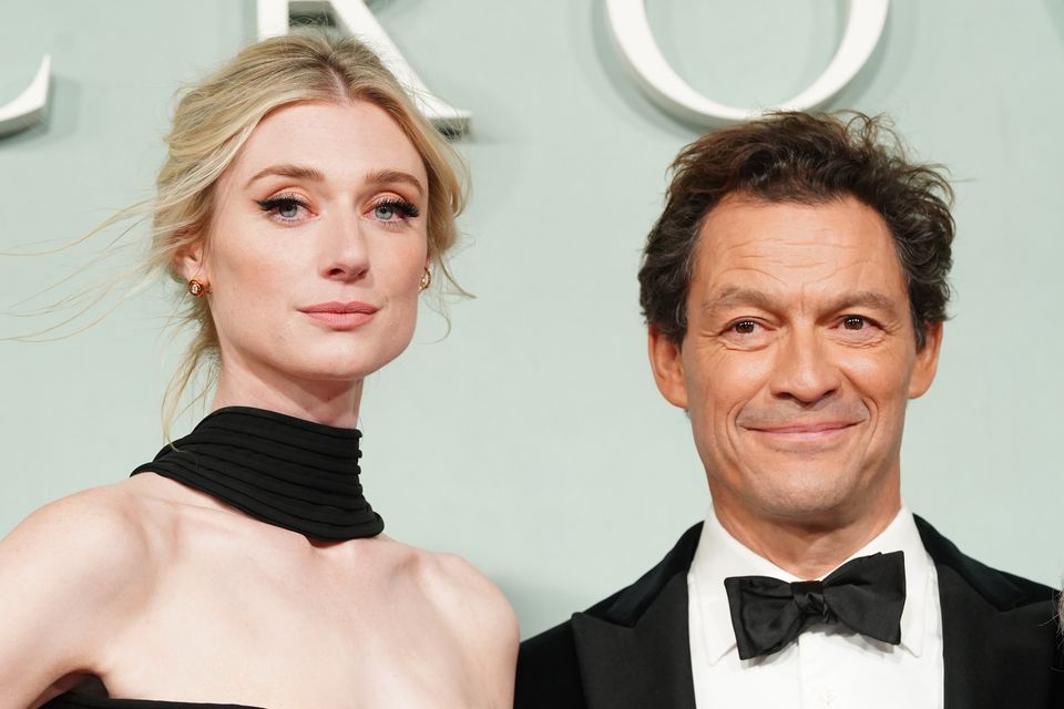 Elizabeth Debicki and Dominic West arrive at the world premiere of The Crown series five (Ian West/PA)