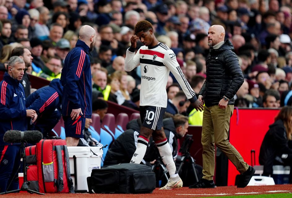 Rashford (centre) was withdrawn after being lucky to escape a second booking (Mike Egerton/PA)