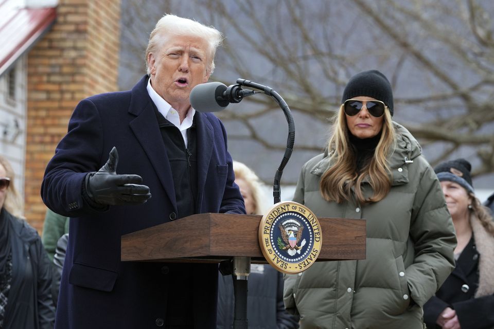 President Donald Trump, along side first lady Melania Trump speaks as he meets with homeowners affected by Hurricane Helene in Swannanoa (Mark Schiefelbein/AP)