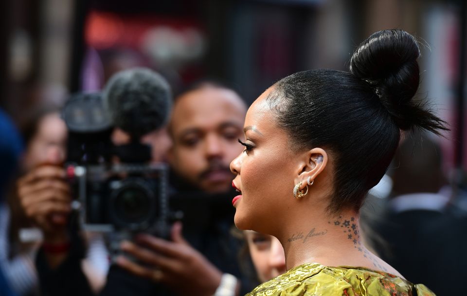 Rihanna appeared to be guarded by members of the Barbados military armed with assault rifles (Ian West/PA)