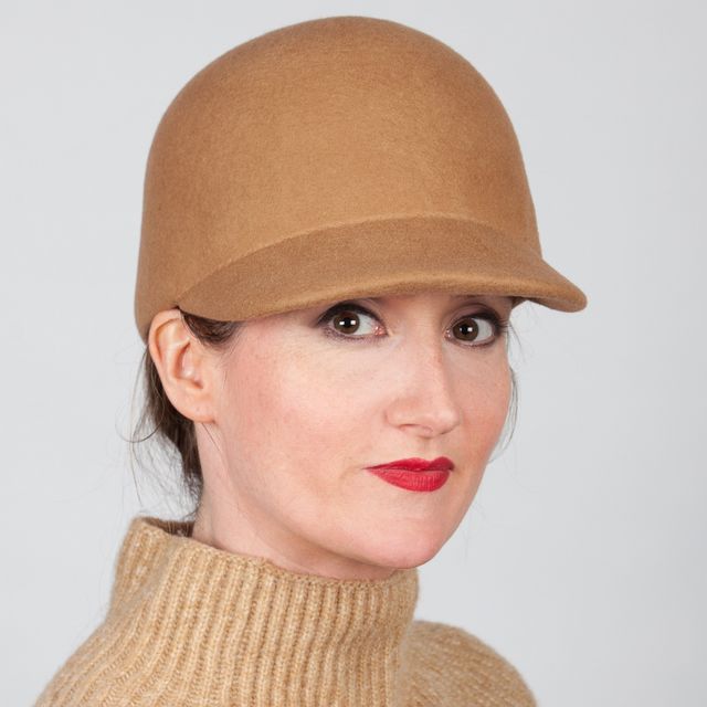 Cap with bow trim, £165, handmadeinbritain.co.uk