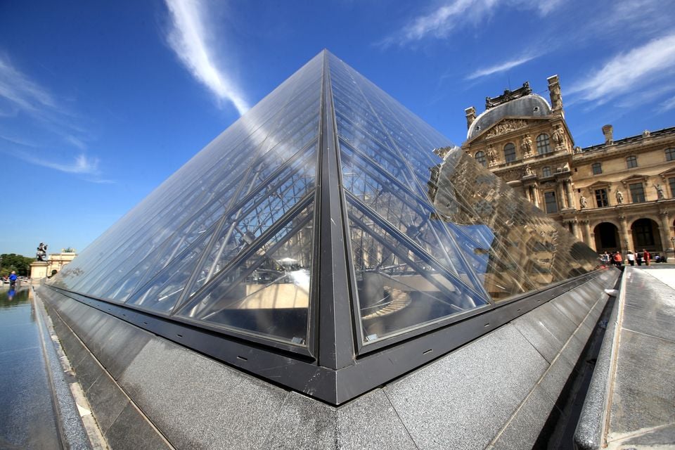 The Louvre’s pyramid was unveiled in the 1980s and now appears outdated (Mike Egerton/PA)