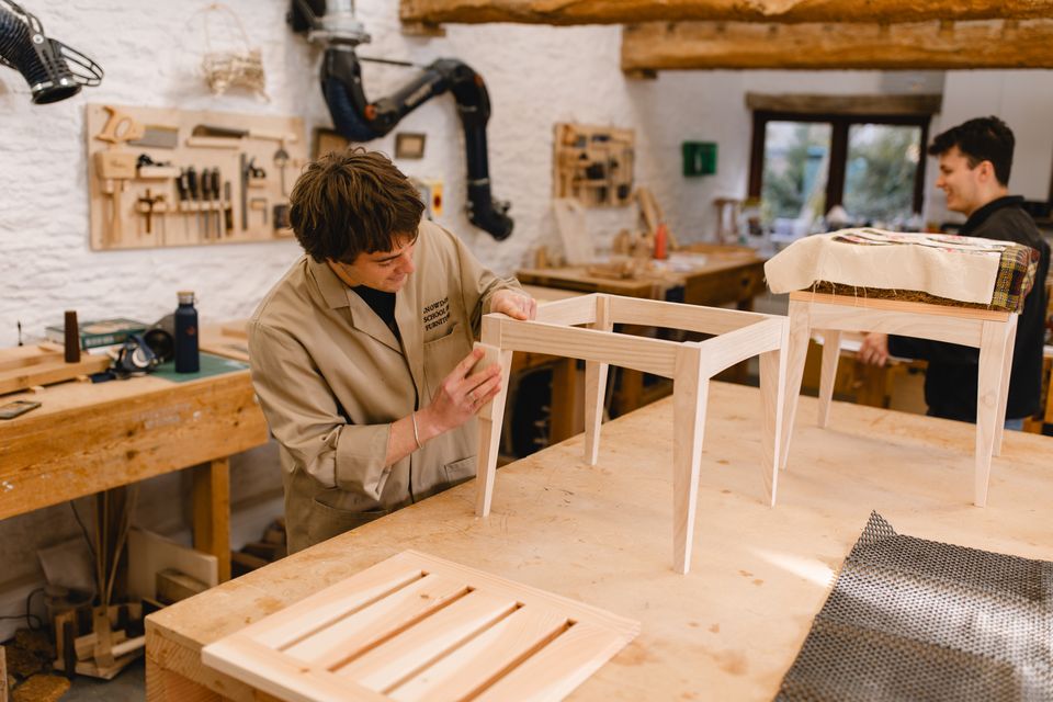 Graduates working on the stools at Highgrove (The King’s Foundation /Courtney Louise Photography/PA)