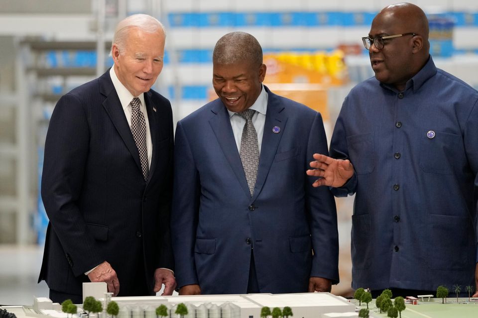 Mr Biden met Angola’s President Joao Lourenco and Guinea-Bissau’s President Umaro Sissoco Embalo at the Carrinho food processing factory near Lobito (AP)