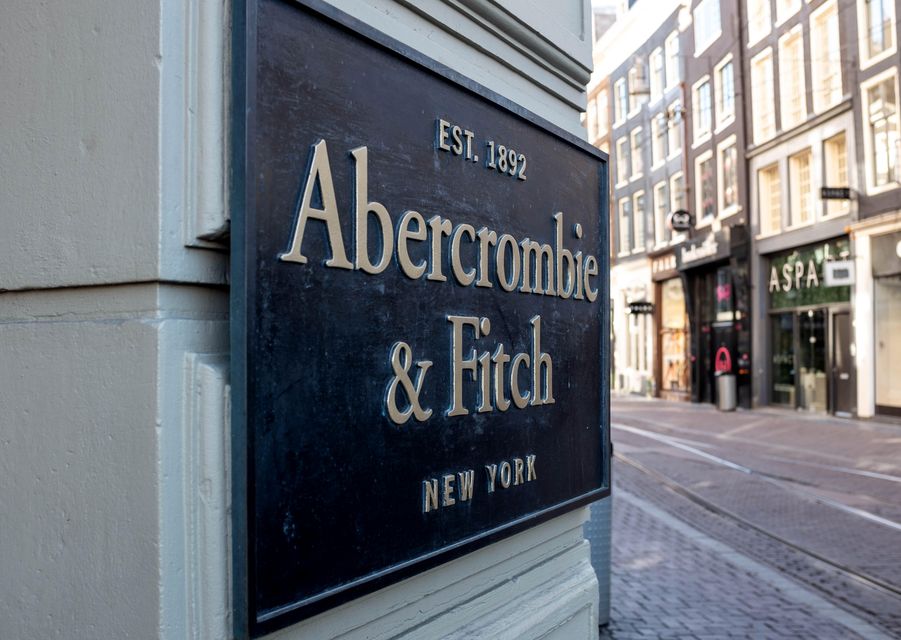 The former boss of fashion giant Abercrombie & Fitch and his British partner have been charged with luring men into taking part in sex parties (Alamy/PA)