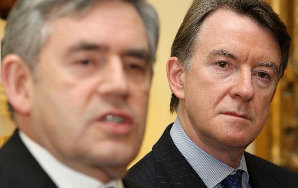 Lord Mandelson looks on as Gordon Brown delivers a speech (Dominic Lipinski/PA)