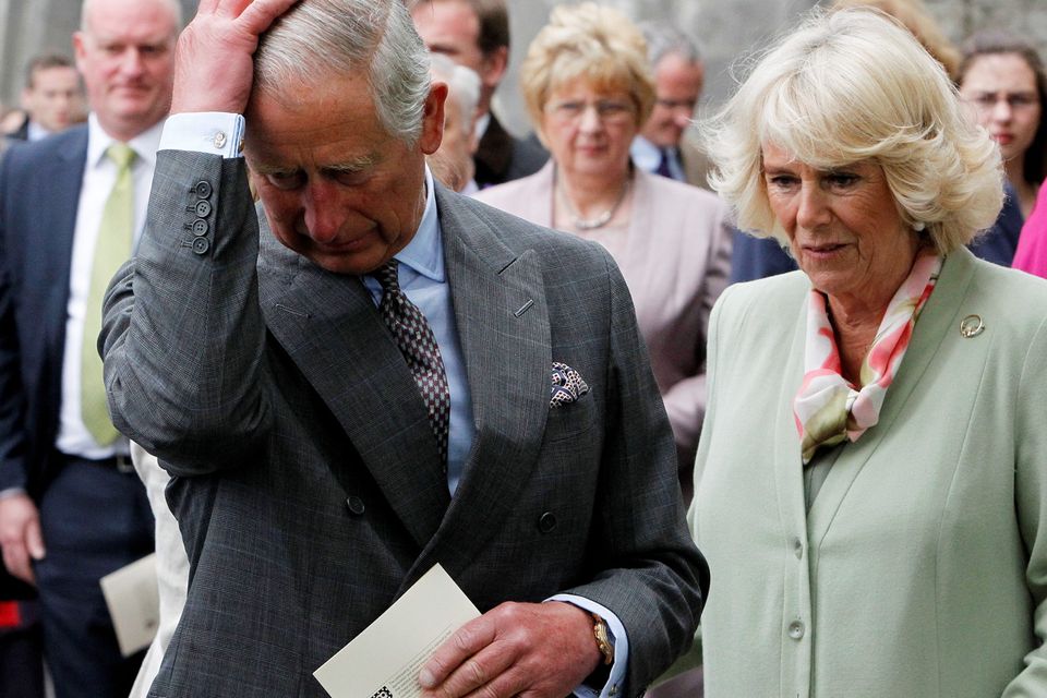 SLIGO, IRLEAND - MAY 20:  Prince Charle, Prince of Wales and Camilla, Duchess of Cornwall attend a ceremony to plant a London Oak tree after a service of peace and reconciliation at St. Columba's Church in Drumcliffe on the second day of a four day visit to Ireland on May 20, 2015 in Sligo, Ireland. The Prince of Wales and Duchess of Cornwall arrived in Ireland yesterday for their four day visit to the Republic and Northern Ireland, the visit has been described by the British Embassy as another important step in promoting peace and reconciliation.  (Photo by Brian Lawless - WPA Pool/Getty Images)