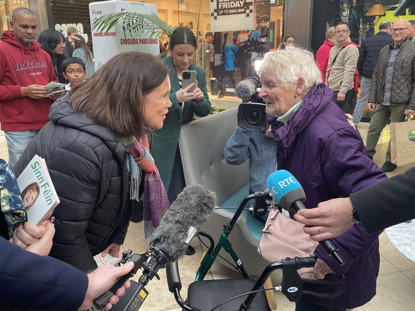 Sinn Fein leader Mary Lou McDonald speaks to members of the public as she canvasses in the Swords Pavilions Shopping Centre, Co Dublin (Grainne Ni Aodha/PA)