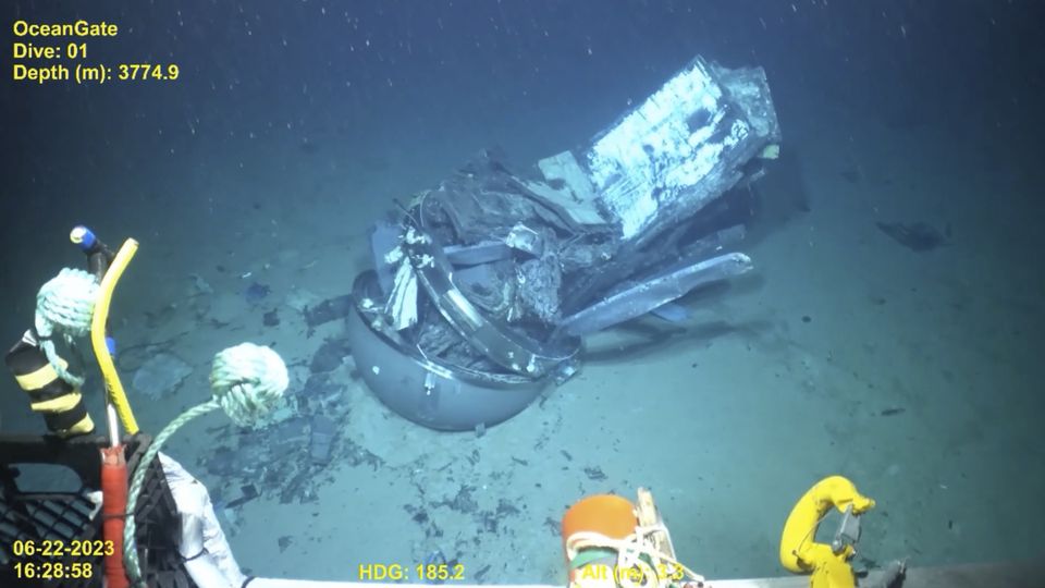 Remains of the Titan submersible on the floor of the Atlantic Ocean (US Coast Guard Video courtesy of Pelagic Research Services via AP)