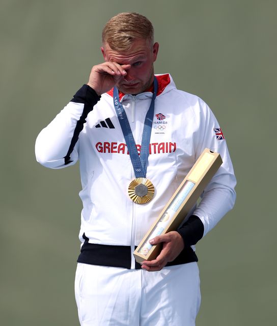 Nathan Hales appeared emotional as he stood on the podium (Isabel Infantes/PA)