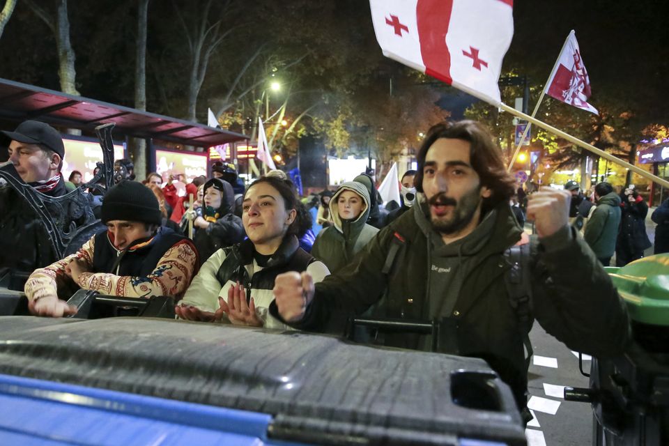 Protesters vowed to stay at the camp around the clock to demand new parliamentary elections (Zurab Tsertsvadze/AP)