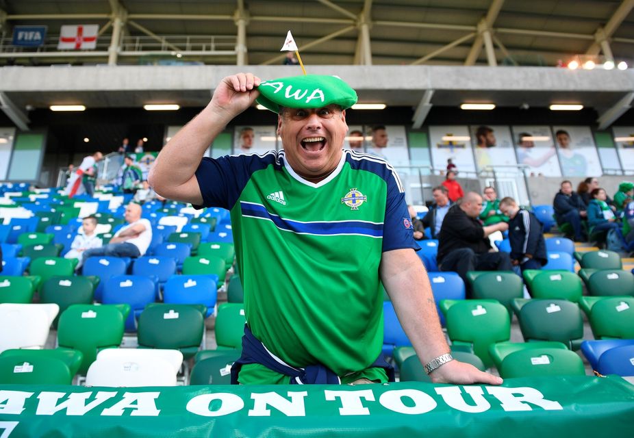 BELFAST, NORTHERN IRELAND - MAY 27: A Northern Ireland fan poses with a green beret before the international friendly game between Northern Ireland and Belarus on May 26, 2016 in Belfast, Northern Ireland. (Photo by Charles McQuillan/Getty Images)