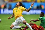 thumbnail: BRASILIA, BRAZIL - JUNE 23:  Enoh Eyong of Cameroon challenges Marcelo of Brazil during the 2014 FIFA World Cup Brazil Group A match between Cameroon and Brazil at Estadio Nacional on June 23, 2014 in Brasilia, Brazil.  (Photo by Buda Mendes/Getty Images)