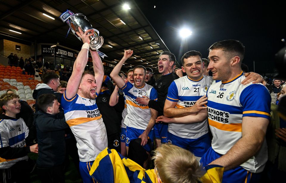 Errigal Ciaran's Niall Kelly, left, celebrates with teammates. Photo: Ramsey Cardy/Sportsfile