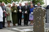 thumbnail: The Prince of Wales (2nd left) and The Duchess of Cornwall (3rd left) at the grave of WB Yeats after attending a peace and reconciliation prayer service at St. Columba's Church in Drumcliffe on day two of a four day visit to Ireland. PRESS ASSOCIATION Photo. Picture date: Wednesday May 20, 2015. See PA story ROYAL Ireland. Photo credit should read: Colm Mahady/PA Wire