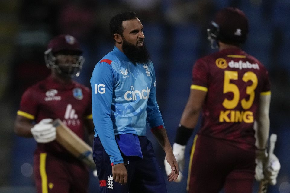 Adil Rashid, centre, had more ODI caps than his 10 team-mates combined (Ricardo Mazalan/AP)