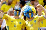 thumbnail: The beautiful game - football fans from around the world. Swedish supporters, their faces painted in the colors of the national flag, cheer as they wait for the start of the Euro 2016 Group E soccer match between Italy and Sweden at the Stadium municipal in Toulouse, France, Friday, June 17, 2016. (AP Photo/Antonio Calanni)