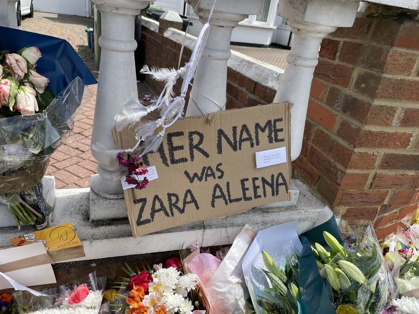 Floral tributes left at the scene on Cranbrook Road in Ilford, east London, where Zara Aleena, 35, was murdered (Ted Hennessey/PA)