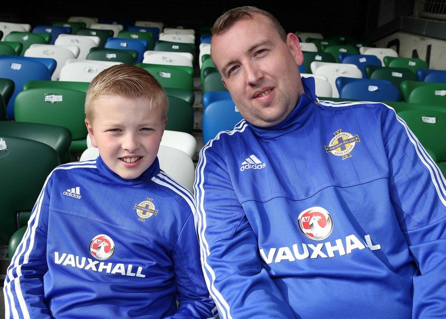 @Press Eye Ltd Northern Ireland- 27th May 2016
Mandatory Credit -Brian Little/Presseye

Darren Hamill and son Scott, aged 10, from Lisburn watching 
Northern Ireland     and Belarus      during Friday night's Vauxhall Friendly International match  at the National Football Stadium at Windsor Park.
Picture by Brian Little/Presseye