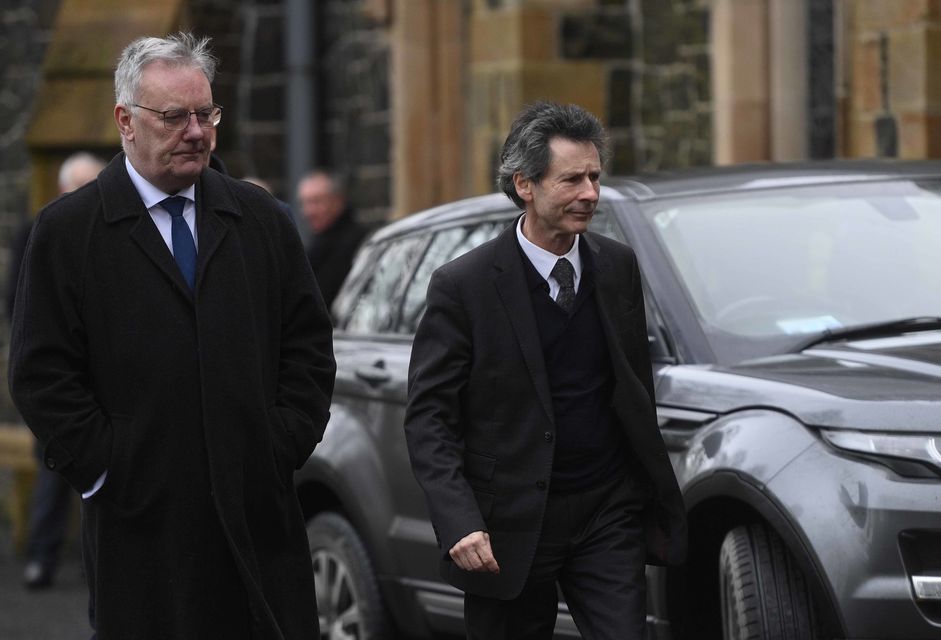 Health Minister Mike Nesbitt and Mark Devenport attend the funeral (Mark Marlow/PA