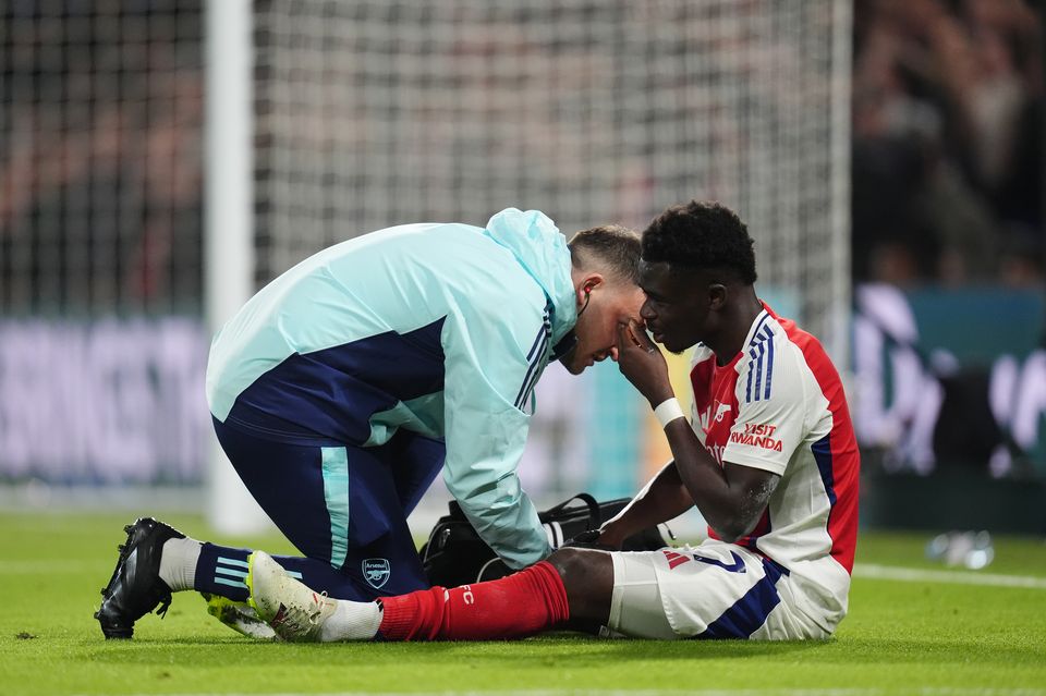 Bukayo Saka, right, is an injury doubt for England after going off against Chelsea (John Walton/PA)