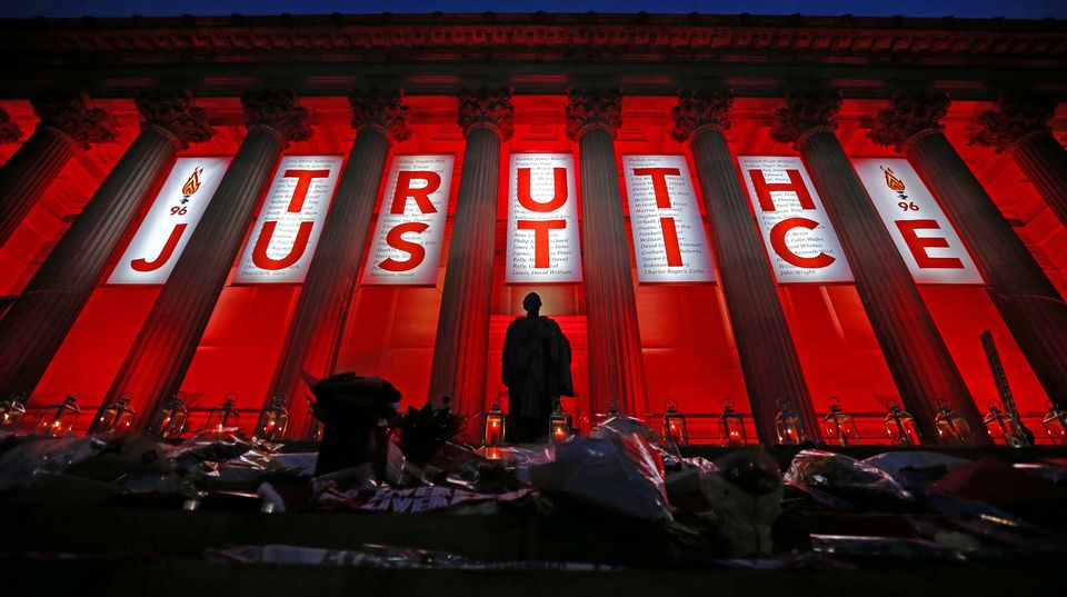 St George’s Hall in Liverpool is illuminated following a special commemorative service to mark the outcome of the Hillsborough inquests (Peter Byrne/PA)