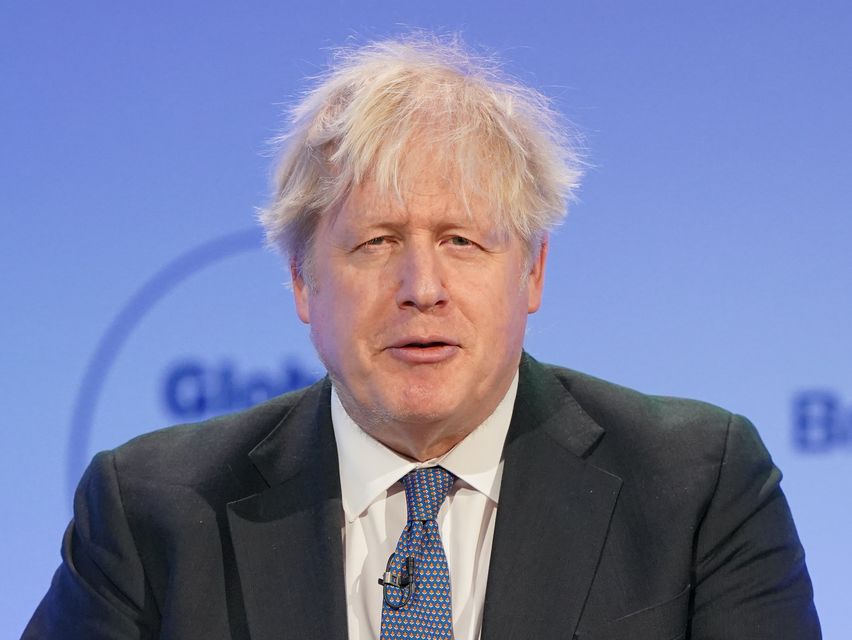 Boris Johnson avoided punishment despite a ‘clear breach’ of appointment rules with his Daily Mail column (Jonathan Brady/PA)