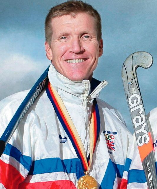 Jimmy Kirkwood with his medals from the 1988 Olympic Games