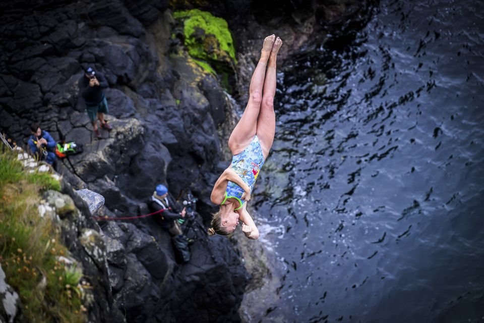 Eleanor Smart of the USA diving from the 20.5 metre cliff during the first competition day. Pic: Red Bull Content Pool/Romina Amato