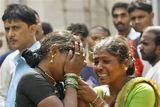 thumbnail: Sharda Janardhan Chitikar, left, is consoled by a relative as she grieves the death of her two children in a terrorist attack as she waits for their bodies outside St. Georges Hospital in Mumbai, India, Thursday, Nov. 27, 2008. Teams of gunmen stormed luxury hotels, a popular restaurant, a crowded train station and a Jewish group's headquarters, killing people, and holding Westerners hostage in coordinated attacks on the nation's commercial center that were blamed on Muslim militants. (AP Photo/Gurinder Osan)