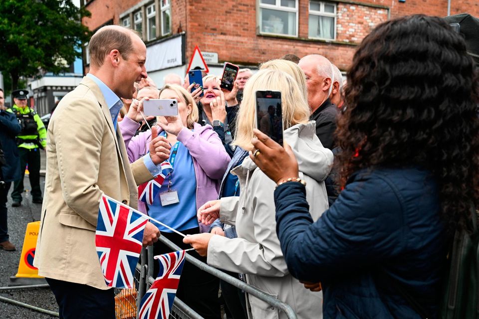 BELFAST, NORTHERN IRELAND - JUNE 27: Prince William, Prince of Wales meets members of the public after his visit to the East Belfast Mission at the Skainos Centre as part of his tour of the UK to launch a project aimed at ending homelessness on June 27, 2023 in Belfast, United Kingdom. The Prince of Wales has launched Homeward, a five-year programme delivered by the Royal Foundation, which will aim to demonstrate the possibility of ending homelessness. He is currently on a 2 day tour of the United Kingdom, visiting charities working to prevent homelessness in England, Scotland and Wales.  (Photo by Tim Rooke -Pool/Getty Images)