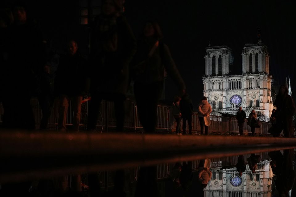 The restoration marks a triumph for Emmanuel Macron – who has not has his troubles to seek, politically (AP)