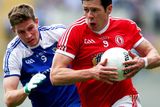 thumbnail: Monaghan's Darren Hughes challenges Sean Cavanagh of Tyrone