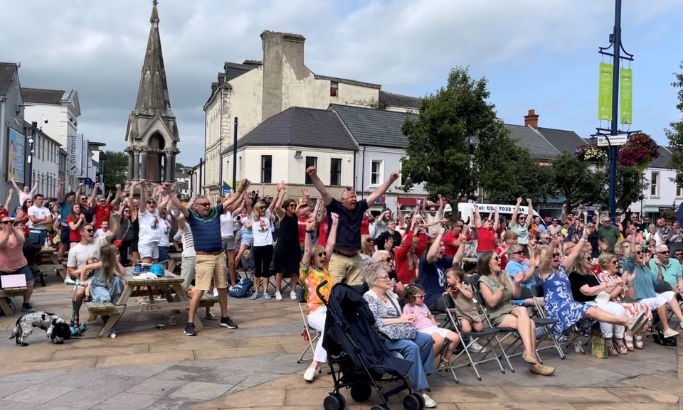 Crowds in Coleraine celebrate Hannah Scott’s gold medal win (David Young/PA).