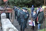 thumbnail: Police line up while concrete blocks are placed at the site during the protest over the drilling