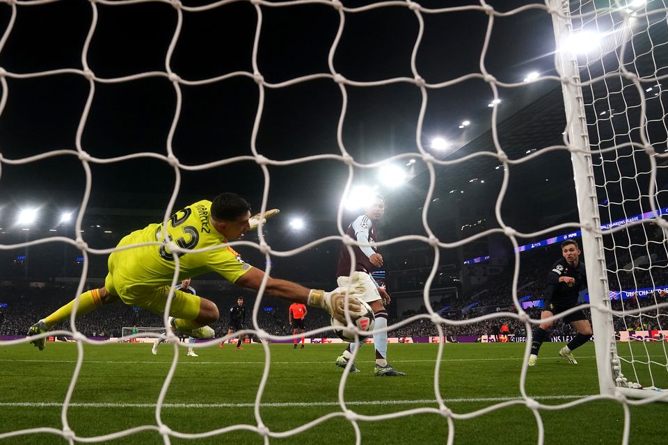 Aston Villa goalkeeper Emiliano Martinez produces a brilliant save (Nick Potts/PA)