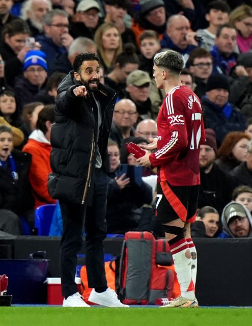 Alejandro Garnacho, right, receives instructions from Ruben Amorim (Bradley Collyer/PA)