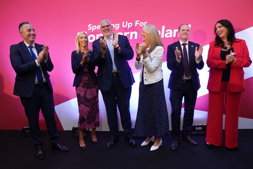 DUP leader Gavin Robinson (third from left) and Deputy First Minister Emma Little-Pengelly (right) during the party’s annual conference (PA)