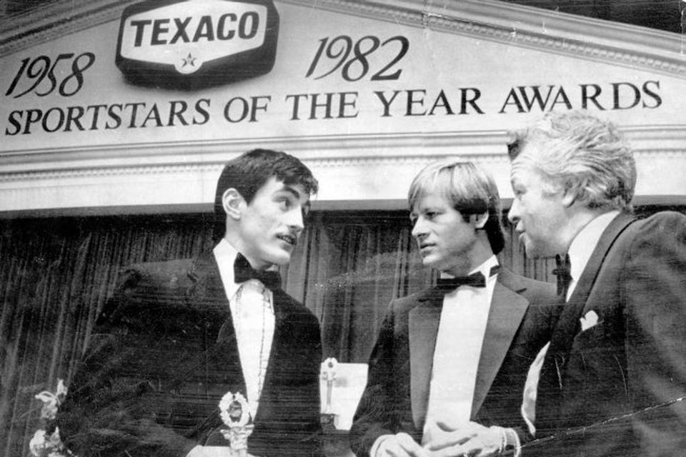 Alex Higgins.  Snooker Legend.  Four Ulster sportsmen were given Texaco Sportstars of the Year Awards (1982) at a banquet in Dublin last - John Watson, Barry McGuigan, Gerry Armstrong and Alex Higgins.  Photographed at the ceremony were McGuigan, Northern Ireland team manager Billy Bingham, who collected the trophy on behalf of Armstrong and Higgins.