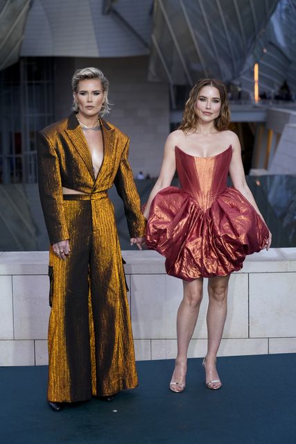 Ashlyn Harris, left, and Sophia Bush in Paris (AP Photo/Rebecca Blackwell)